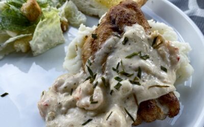 Blackened Catfish Topped with a Crawfish Cream Sauce￼