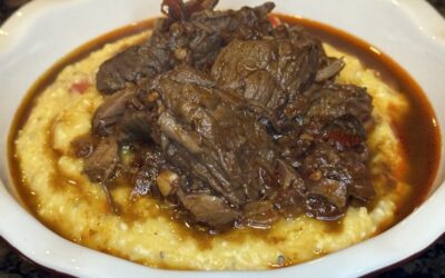 Spicy Stewed Beef with Creamy Cheddar Grits
